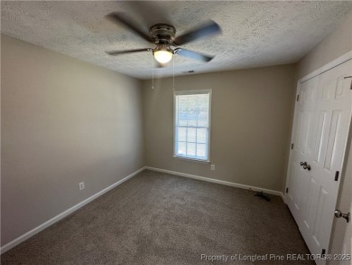 Welcome to this beautifully renovated 3-bedroom, 2-bathroom home on Hope Mills Golf and Country Club in North Carolina - for sale on GolfHomes.com, golf home, golf lot