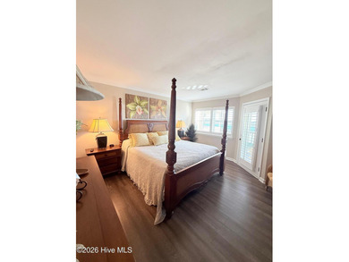 Welcome to coastal living at its finest. This luxurious home on Brick Landing Plantation Yacht and Golf Club in North Carolina - for sale on GolfHomes.com, golf home, golf lot