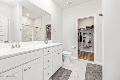 Welcome to your pristine coastal retreat! Situated on a on Brunswick Plantation and Golf Resorts in North Carolina - for sale on GolfHomes.com, golf home, golf lot