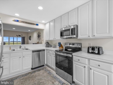 Enjoy beautiful water views from every room in this top floor on Bethany Bay Golf Club in Delaware - for sale on GolfHomes.com, golf home, golf lot