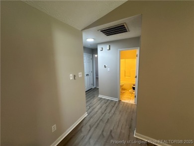 Welcome to this beautifully renovated 3-bedroom, 2-bathroom home on Hope Mills Golf and Country Club in North Carolina - for sale on GolfHomes.com, golf home, golf lot