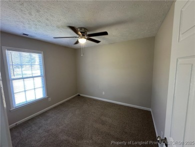 Welcome to this beautifully renovated 3-bedroom, 2-bathroom home on Hope Mills Golf and Country Club in North Carolina - for sale on GolfHomes.com, golf home, golf lot