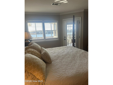 Welcome to coastal living at its finest. This luxurious home on Brick Landing Plantation Yacht and Golf Club in North Carolina - for sale on GolfHomes.com, golf home, golf lot