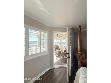 Welcome to coastal living at its finest. This luxurious home on Brick Landing Plantation Yacht and Golf Club in North Carolina - for sale on GolfHomes.com, golf home, golf lot