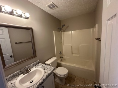 Welcome to this beautifully renovated 3-bedroom, 2-bathroom home on Hope Mills Golf and Country Club in North Carolina - for sale on GolfHomes.com, golf home, golf lot