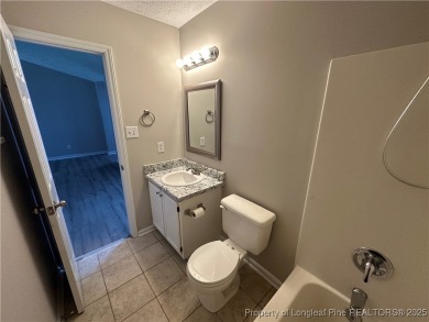 Welcome to this beautifully renovated 3-bedroom, 2-bathroom home on Hope Mills Golf and Country Club in North Carolina - for sale on GolfHomes.com, golf home, golf lot