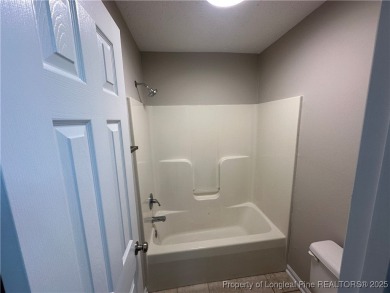 Welcome to this beautifully renovated 3-bedroom, 2-bathroom home on Hope Mills Golf and Country Club in North Carolina - for sale on GolfHomes.com, golf home, golf lot