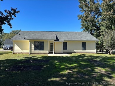 Welcome to this beautifully renovated 3-bedroom, 2-bathroom home on Hope Mills Golf and Country Club in North Carolina - for sale on GolfHomes.com, golf home, golf lot
