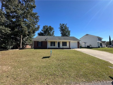 Welcome to this beautifully renovated 3-bedroom, 2-bathroom home on Hope Mills Golf and Country Club in North Carolina - for sale on GolfHomes.com, golf home, golf lot