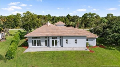 Welcome to your own private sanctuary-an elegant courtyard pool on The Cape Club of Palm City in Florida - for sale on GolfHomes.com, golf home, golf lot