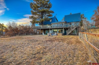 Blue Pitcher Lindner, Jann C Pitcher Real Estate, C: , blue,  : on Pagosa Springs Golf Club in Colorado - for sale on GolfHomes.com, golf home, golf lot