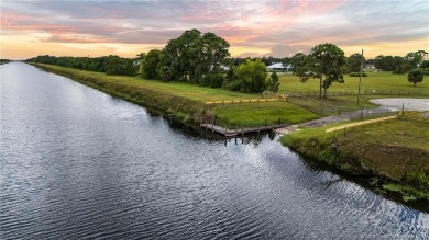 Welcome to your own private sanctuary-an elegant courtyard pool on The Cape Club of Palm City in Florida - for sale on GolfHomes.com, golf home, golf lot