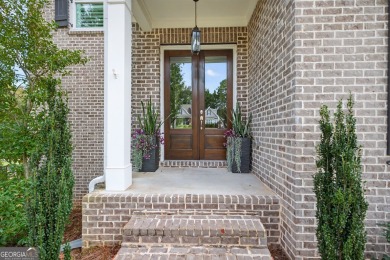 Welcome to refined living in one of Monroe's most charming and on Monroe Golf and Country Club in Georgia - for sale on GolfHomes.com, golf home, golf lot