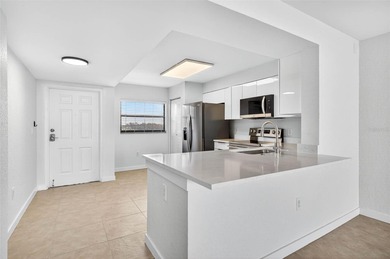 One or more photo(s) has been virtually staged. Live Above It on Cove Cay Country Club in Florida - for sale on GolfHomes.com, golf home, golf lot