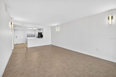 One or more photo(s) has been virtually staged. Live Above It on Cove Cay Country Club in Florida - for sale on GolfHomes.com, golf home, golf lot