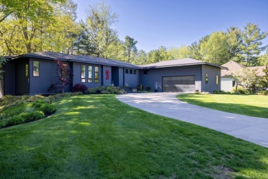 This Mid-Century Modern masterpiece is located near Lake on Grand Haven Golf Club in Michigan - for sale on GolfHomes.com, golf home, golf lot