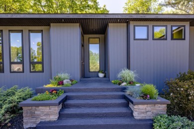 This Mid-Century Modern masterpiece is located near Lake on Grand Haven Golf Club in Michigan - for sale on GolfHomes.com, golf home, golf lot