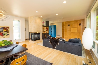 This Mid-Century Modern masterpiece is located near Lake on Grand Haven Golf Club in Michigan - for sale on GolfHomes.com, golf home, golf lot