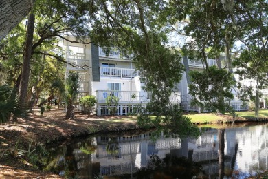 Unique, 1st floor villa, end unit, remodeled w/ a more open on The Plantation Course At Edisto in South Carolina - for sale on GolfHomes.com, golf home, golf lot