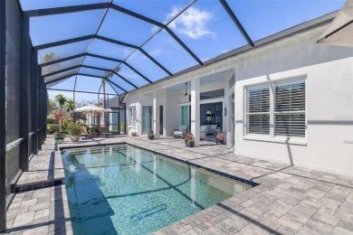Under contract-accepting backup offers. Gorgeous 3-Bedroom Home on University Park Country Club in Florida - for sale on GolfHomes.com, golf home, golf lot