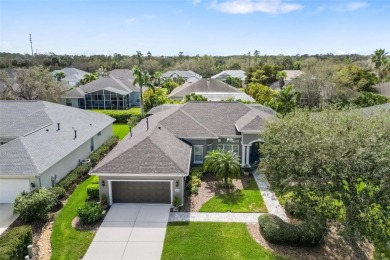 Under contract-accepting backup offers. Gorgeous 3-Bedroom Home on University Park Country Club in Florida - for sale on GolfHomes.com, golf home, golf lot