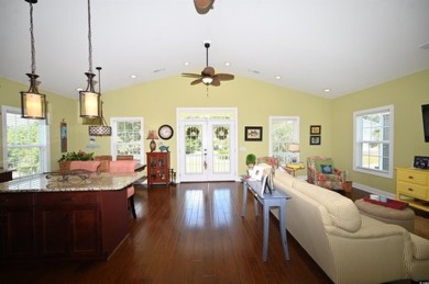 STUNNING HOME features three bedrooms and three full bathrooms on Tidewater Golf Club and Plantation in South Carolina - for sale on GolfHomes.com, golf home, golf lot