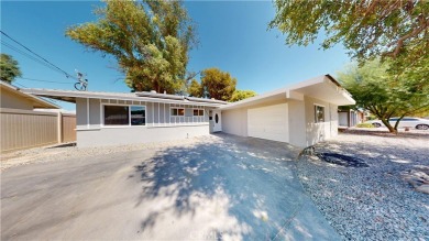 Welcome to this spacious 4-bedroom, 3-bath home perfectly on Palm Desert Country Club in California - for sale on GolfHomes.com, golf home, golf lot