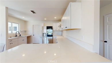 Welcome to this spacious 4-bedroom, 3-bath home perfectly on Palm Desert Country Club in California - for sale on GolfHomes.com, golf home, golf lot
