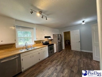 Welcome to Club Colony and your opportunity to own a home on on Hartsville Country Club in South Carolina - for sale on GolfHomes.com, golf home, golf lot