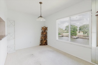 Moorings of Tarpon Springs, located across the street from on Tarpon Springs Golf Course in Florida - for sale on GolfHomes.com, golf home, golf lot