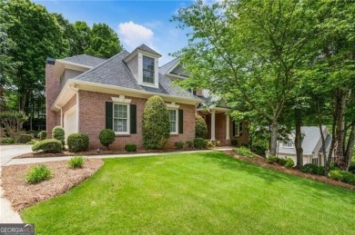 Nestled on a beautifully landscaped half-acre lot in on Chapel Hills Golf and Country Club in Georgia - for sale on GolfHomes.com, golf home, golf lot