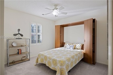 Take in stunning lagoon views from newly screened porch or on Hidden Cypress Golf Club in South Carolina - for sale on GolfHomes.com, golf home, golf lot