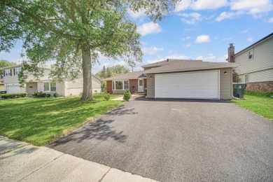 This just updated, upgraded and renovated HOME on tree lined on Ravisloe Country Club in Illinois - for sale on GolfHomes.com, golf home, golf lot