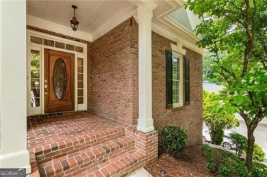 Nestled on a beautifully landscaped half-acre lot in on Chapel Hills Golf and Country Club in Georgia - for sale on GolfHomes.com, golf home, golf lot
