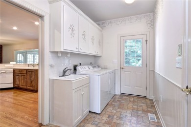 A charming cul-de-sac setting, a welcoming ambiance, and  a .72 on Two Rivers Country Club in Virginia - for sale on GolfHomes.com, golf home, golf lot