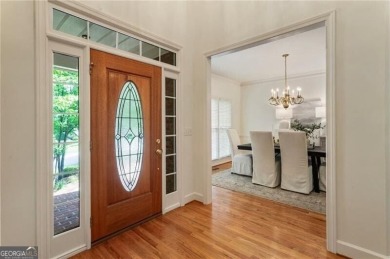 Nestled on a beautifully landscaped half-acre lot in on Chapel Hills Golf and Country Club in Georgia - for sale on GolfHomes.com, golf home, golf lot