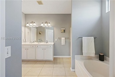 Take in stunning lagoon views from newly screened porch or on Hidden Cypress Golf Club in South Carolina - for sale on GolfHomes.com, golf home, golf lot