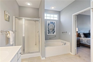 Take in stunning lagoon views from newly screened porch or on Hidden Cypress Golf Club in South Carolina - for sale on GolfHomes.com, golf home, golf lot