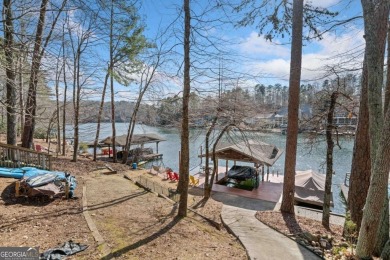 Welcome to your own slice of paradise! This charming waterfront on The Highlands Course at Lake Arrowhead in Georgia - for sale on GolfHomes.com, golf home, golf lot