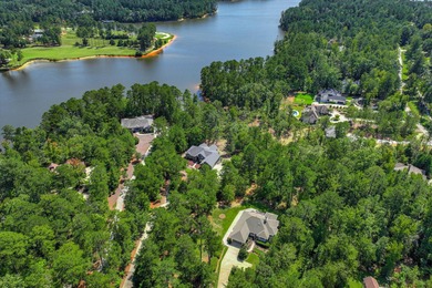 Discover exceptional lake living at 140 Bereau Drive, one of the on Monticello Golf Club At Savannah Lakes in South Carolina - for sale on GolfHomes.com, golf home, golf lot