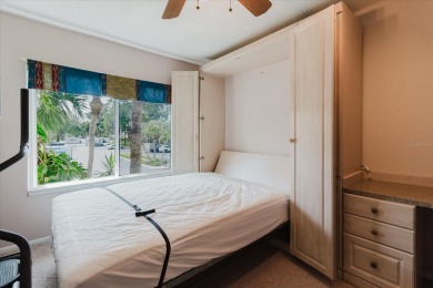 Moorings of Tarpon Springs, located across the street from on Tarpon Springs Golf Course in Florida - for sale on GolfHomes.com, golf home, golf lot