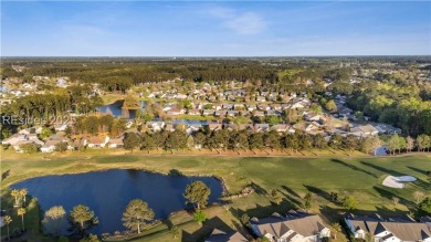 Take in stunning lagoon views from newly screened porch or on Hidden Cypress Golf Club in South Carolina - for sale on GolfHomes.com, golf home, golf lot