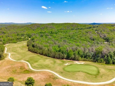 Welcome to your own slice of paradise! This charming waterfront on The Highlands Course at Lake Arrowhead in Georgia - for sale on GolfHomes.com, golf home, golf lot