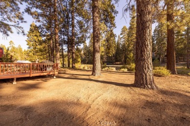 Enveloped by a quiet grove of mature pines and backing to a on Big Bear Mountain Ski and Golf Resort in California - for sale on GolfHomes.com, golf home, golf lot