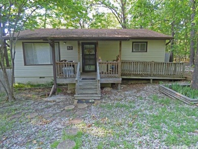 Needs a Little TLC - This 3 bedroom house will make excellent on Cherokee Village North Course in Arkansas - for sale on GolfHomes.com, golf home, golf lot