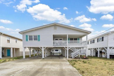 GREAT RENTAL INCOME!!  This Cherry Grove channel home is a on Beachwood Golf Club in South Carolina - for sale on GolfHomes.com, golf home, golf lot