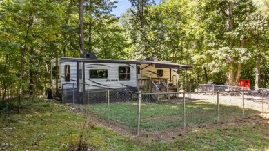 FIVE CAMP LOTS COMBINED INTO ONE BEAUTIFUL LAKE RETREAT!! One on River Golf and Country Club at Lake Royale in North Carolina - for sale on GolfHomes.com, golf home, golf lot