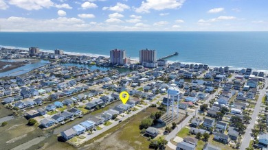 GREAT RENTAL INCOME!!  This Cherry Grove channel home is a on Beachwood Golf Club in South Carolina - for sale on GolfHomes.com, golf home, golf lot
