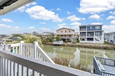 GREAT RENTAL INCOME!!  This Cherry Grove channel home is a on Beachwood Golf Club in South Carolina - for sale on GolfHomes.com, golf home, golf lot