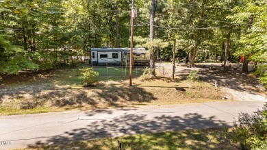 FIVE CAMP LOTS COMBINED INTO ONE BEAUTIFUL LAKE RETREAT!! One on River Golf and Country Club at Lake Royale in North Carolina - for sale on GolfHomes.com, golf home, golf lot